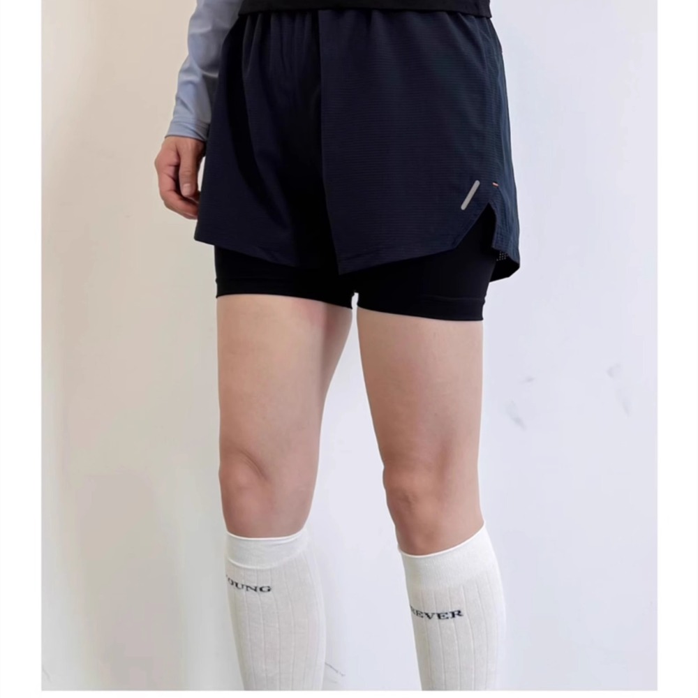 Damskie spodenki sportowe dwuw – Running Gear Junior recenzja i cena
