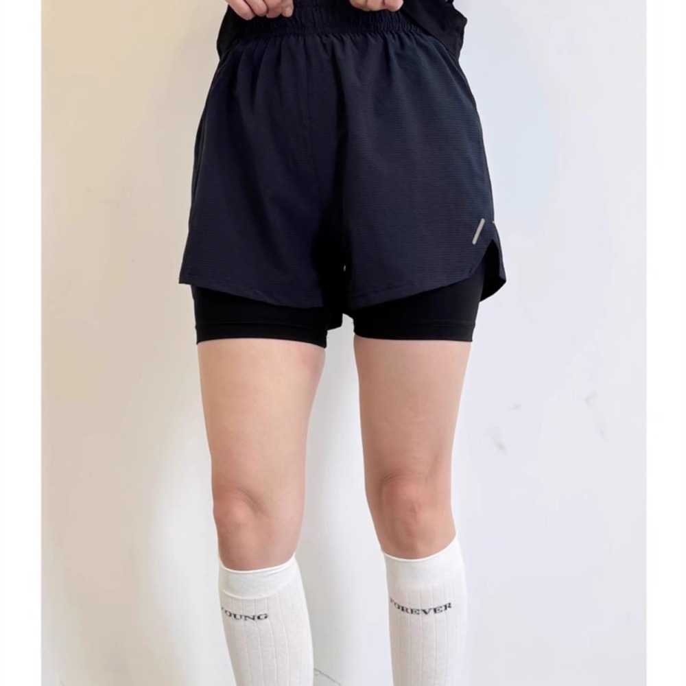 Damskie spodenki fitness 2 w 1 – Running Gear Junior recenzja i cena